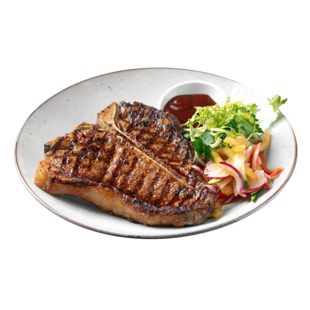 isolated portion of grilled beef t-bone steak - beef meat t bone steak steak imagens e fotografias de stock