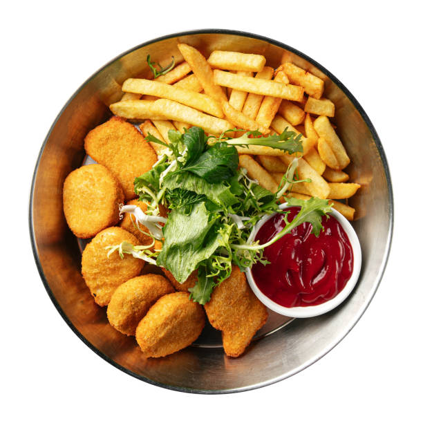 istock Isolated bowl of chicken nuggets with potato 1409424056