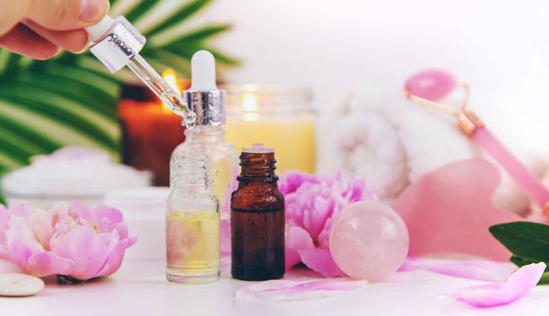istock Pink flowers on white background spa facial. Selective focus. 1409425820