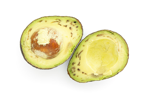 Stale avocado against white background