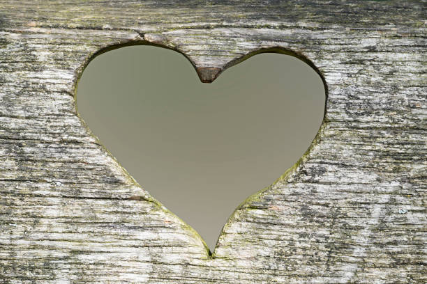 istock Heart carved in wood. 1409431220
