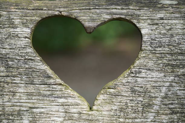 istock Heart carved in wood. 1409431221