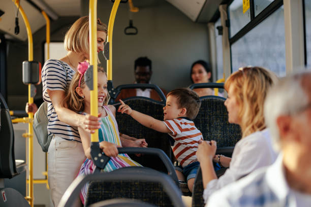 istock Moms with children in public transportation 1409431399