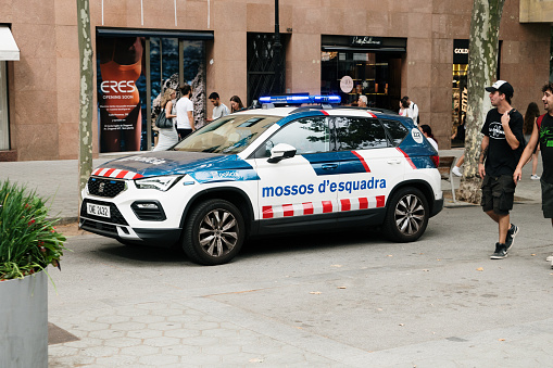 Barcelona, Spain - 21 June 2022: A SEAT Ateca used as Mossos d'Esquadra (Catalonian regional police force) in a street of Barcelona