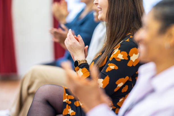 istock Group of businesspeople clapping hands after a successful training session 1409432850