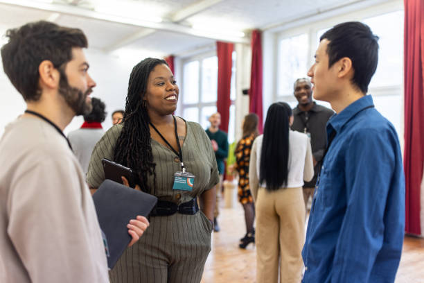 istock Multiracial businesspeople networking at a conference 1409432878