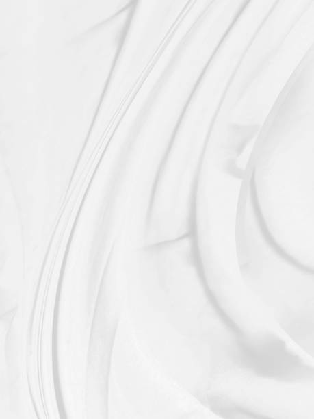 istock soft fabric textured white beauty abstract smooth clean.  fashion textile curve shape decorate background 1409434706
