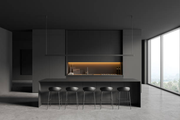 istock Grey kitchen interior with island and bar seats, shelves and window 1409436668