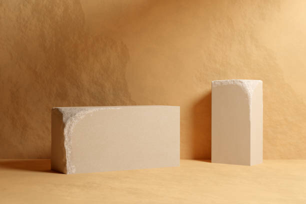 istock Beige sandstone podium mockup 1409437198