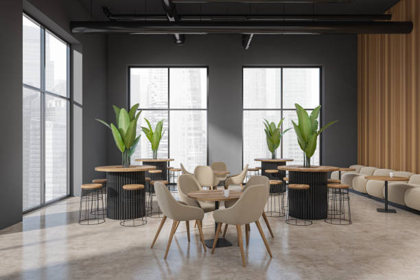 istock Grey cafe interior with couch and bar chairs, eating area and window 1409438585