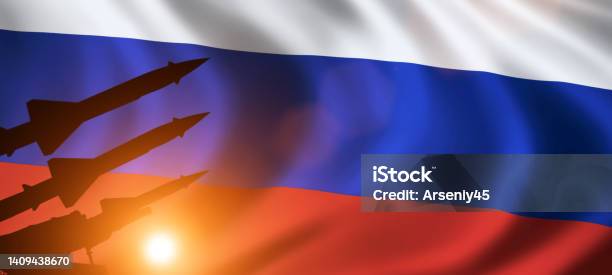 Silhouette Of Missiles On Russia Flag News Concept Background Stock Photo - Download Image Now