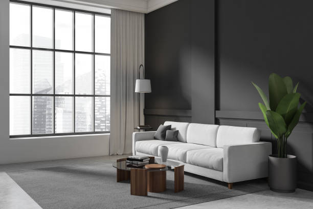 istock Grey living room interior with sofa and coffee table, panoramic window 1409439425