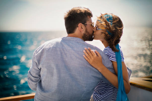 istock Young couple on a sailing cruise. 1409442464