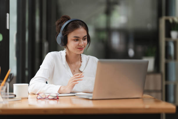 istock Image of Young woman working online on laptop computer. studying or working from home online concept. 1409445868