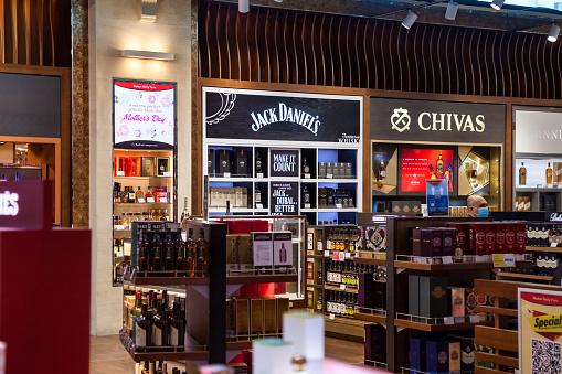 Dubai, UAE, march 2022: Duty free store alcohol company for duty-free operations at International Airport. Retail alco area section is one of fastest growing major hubs. Copy space