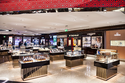 Dubai, UAE, march 2022: Duty free store watch company for duty-free operations at International Airport. Retail watch area section is one of fastest growing major hubs. Copy space