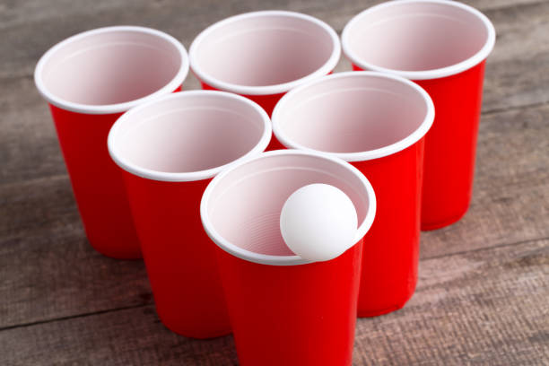 istock Game Beer Pong on wooden table 1409448720