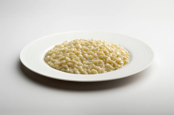 istock Parmesan cheese risotto in White dinner plate 1409451075
