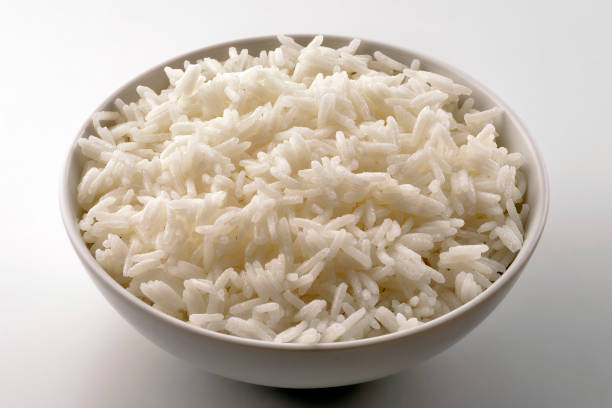 tigela branca com arroz basmati - clipping path rice white rice basmati rice - fotografias e filmes do acervo