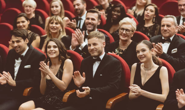 istock Excited audience clapping in opera house 1409452586
