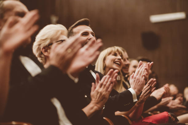 istock Excited audience clapping in the theater 1409453239