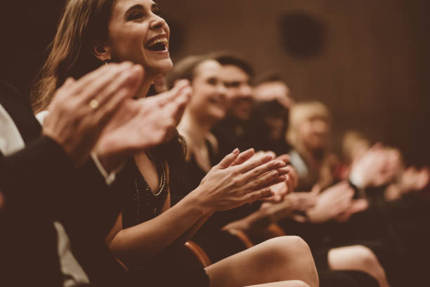 istock Excited audience clapping in the theater 1409453570