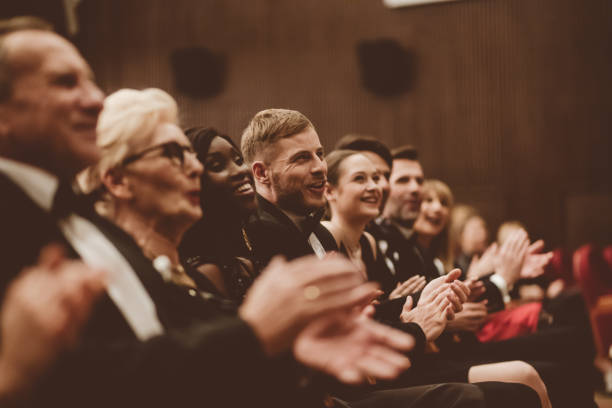 istock Spectators clapping in the theater 1409455831