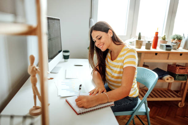 istock Getting her home business up and running 1409459729