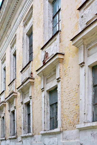 istock A rundown wall of an old brick house 1409459765