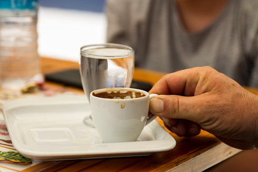 Drinking Turkish Coffee