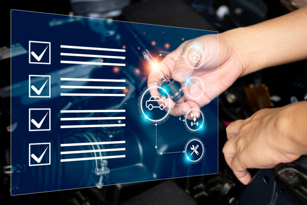 istock Car service business and smart virtual screen concept,Technician check car headlight bulb and basic item in smart checklist with car engine room in background 1409460152