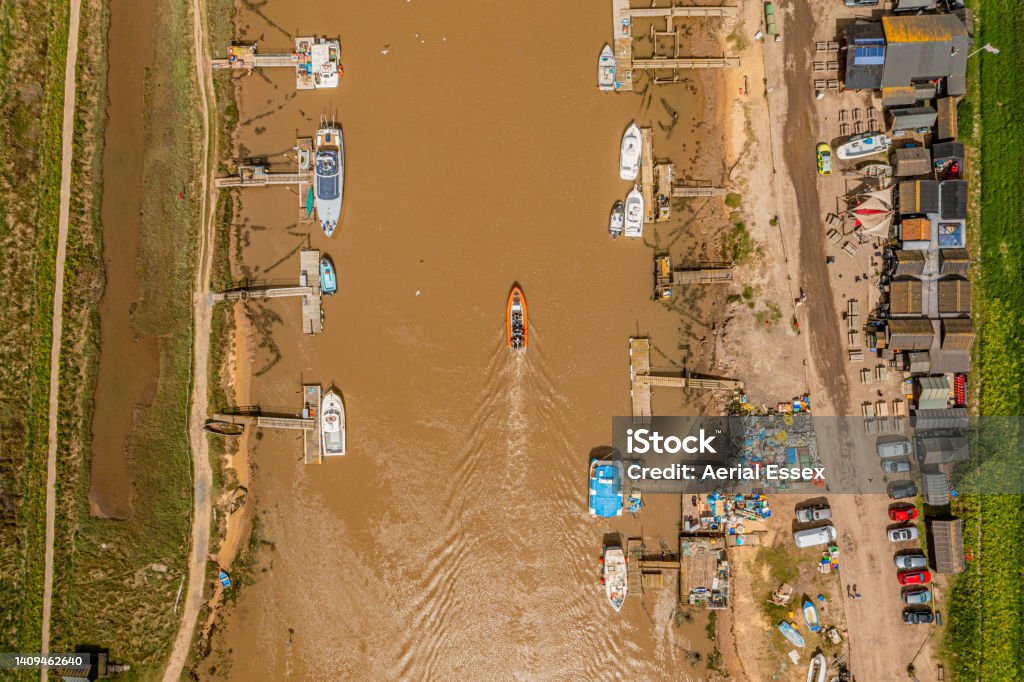 Aerial photo of the River Blyth, Suffolk. Photo captured nearer the mouth of the river between Southwold and Walberswick. Southwold's famous rib 'Coastal Voyager' can be seen in the photo as well. Aerial View Stock Photo