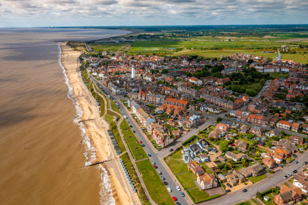 Aerial photo of Southwold, Suffolk. A drones view of the popular tourist seaside town of Southwold, Suffolk. Home of Adnams brewery, beautiful sandy beaches, a traditional pier and a thriving market town atmosphere. southwold stock pictures, royalty-free photos & images