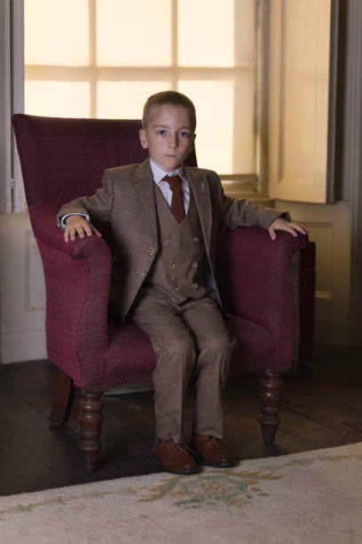 istock Little boy relaxing in his sitting room 1409462983