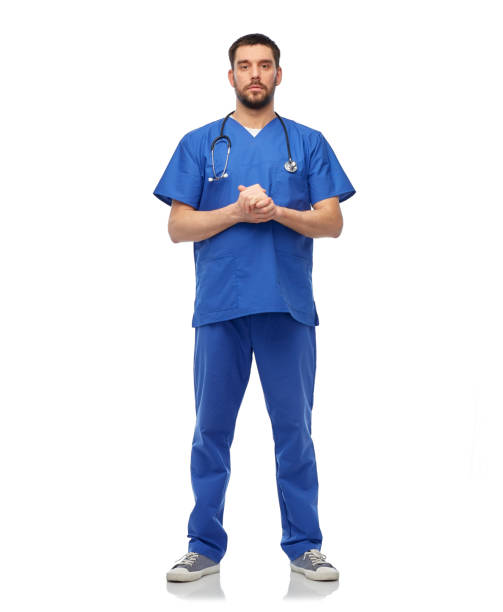 istock doctor or male nurse with stethoscope 1409463011