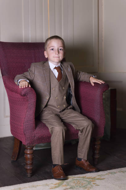 istock Little boy relaxing in his sitting room 1409463020