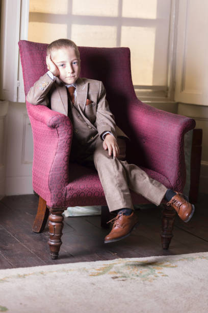 istock Little boy relaxing in his sitting room 1409463150