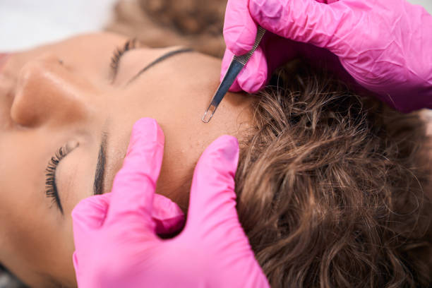 istock Young woman is being cleaned with a special tool 1409471035