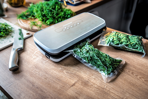 Vacuum packing machine, green dill