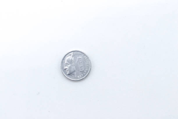 istock 1 pesetas old spanish coins on white background 1409473984
