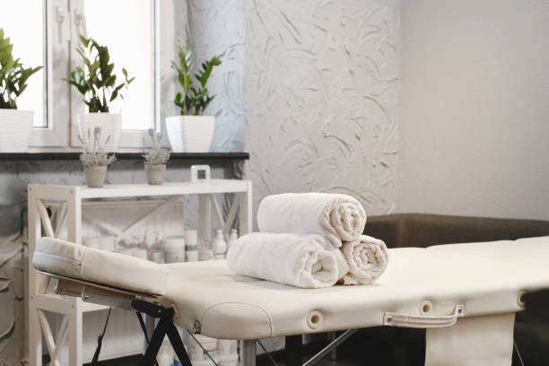 istock towels on massage table in empty beauty salon 1409474118