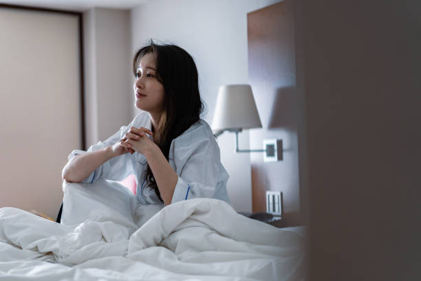 istock Young woman suffering from hangover 1409475440