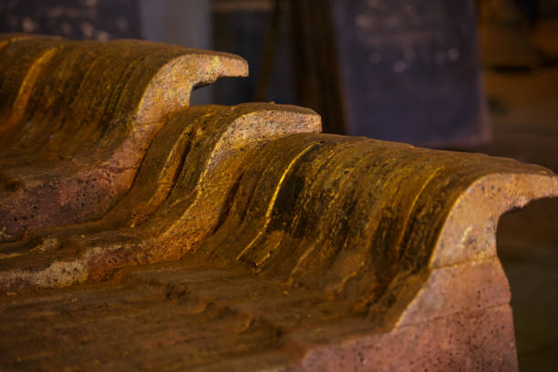 Closeup view of copper anodes. Casting machine copper foundry workshop.