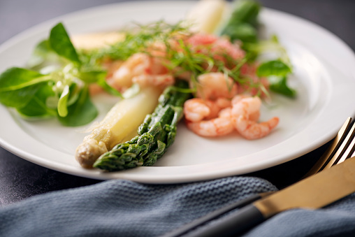 Traditional danish dish of fresh green and white asparagus, with a hollandaise sauce, “stenbiderrogn” which is Danish caviar from the lumpfish, and fjord prawns which doesn’t translate too well but they are almost freshwater prawns that live in the fjords or sea lakes around Denmark.