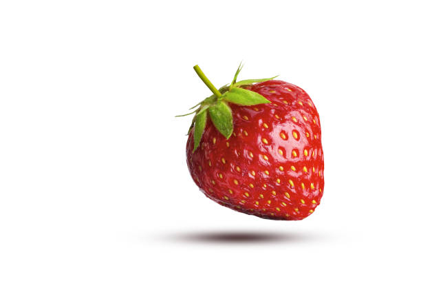 istock Flying strawberry. Isolated on white background 1409487785