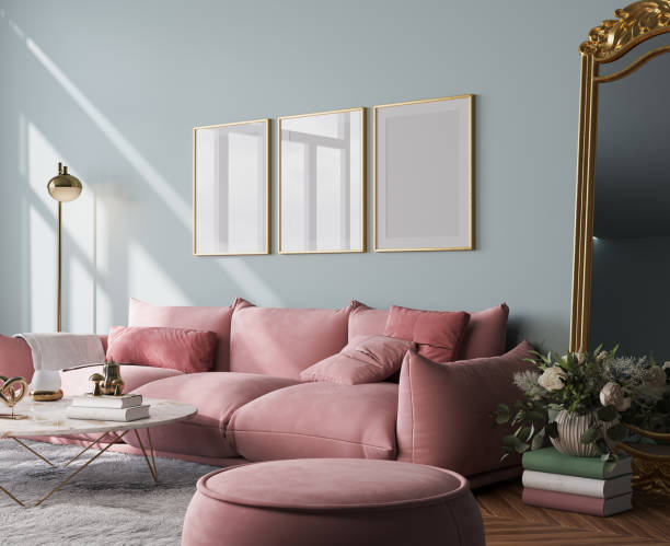 Poster mockup in modern living room with pink sofa and classic golden mirror on pastel interior background, 3d render stock photo
