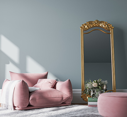 Art deco style living room with pink sofa and armchair.