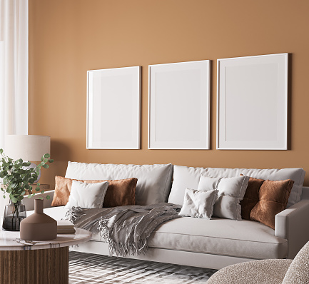 Poster frame mock-up in home interior, living room in beige and white colors