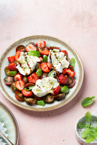 istock Salad with mozzarella, strawberries and cherry tomatoes 1409492328