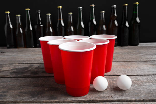 istock Game Beer Pong on wooden table 1409497599